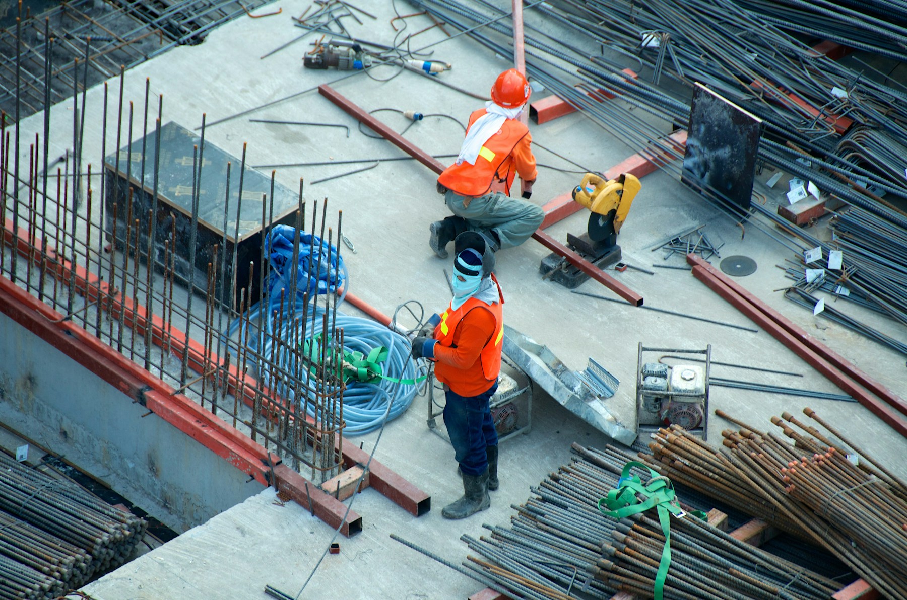 Contractors working together on an active construction site